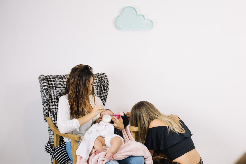 woman-playing-with-baby-feeding