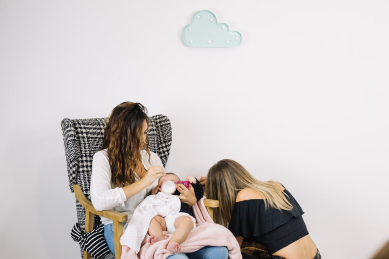 woman-playing-with-baby-feeding